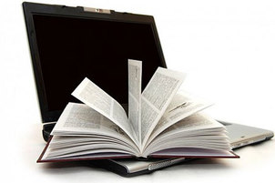 libro-di-carta-su-personal-computer